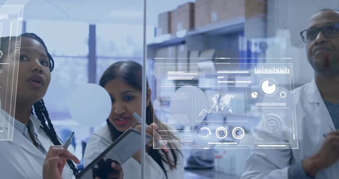 Research team tapping tablet activating data overlays on glass while annotating research charts