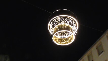 round Christmas decoration at night