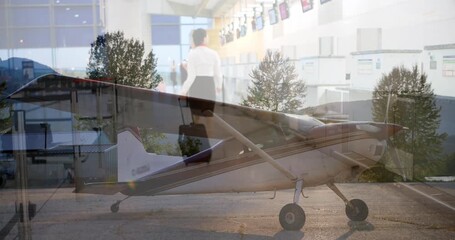 Animation of network of connections over couple sitting on beach - Powered by Adobe