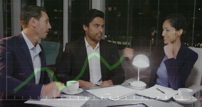 Two business people shaking hands in an office