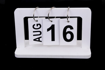 August 16 on calendar on black background