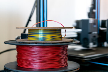Spool of yellow pla filament for printing 3d printer