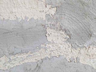 White and grey damaged grunge wall texture. Old paint and cement abstract background.