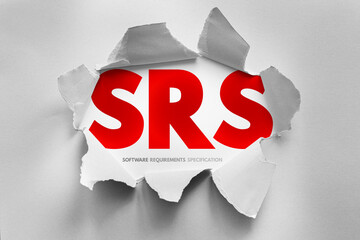SRS acronym for Software Requirements Specification emerges from torn paper, symbolizing the formal documentation of functional and non-functional requirements for software development projects