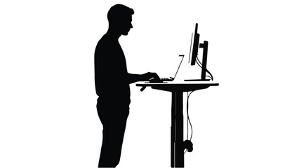 Silhouette of man working on laptop computer at standing desk with monitor in modern office setting for business productivity concept