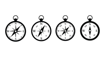 Four vintage compasses displayed in a row black and white silhouette © Rita