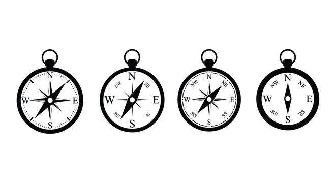 Four vintage compasses displayed in a row black and white silhouette