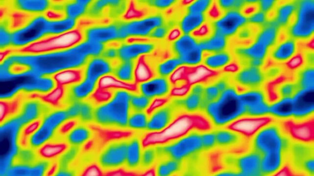 Infrared picture of the sea floor at low tide. Areas of water and sand (red) Dynamic background. Image from thermal imager device.