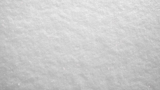 Freshly fallen snow surface with subtle texture for winter landscapes and backgrounds