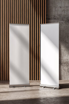 Pull up banner mockup stands in the lobby. Blank roll up poster stands in elegant hallway interior