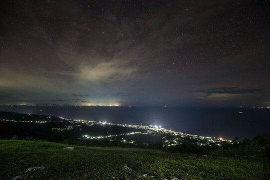 Night photography of Oslob town from top of mountains
