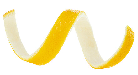 Fresh lemon zest isolated on a white background. Citrus twist peel. Lemon skin.