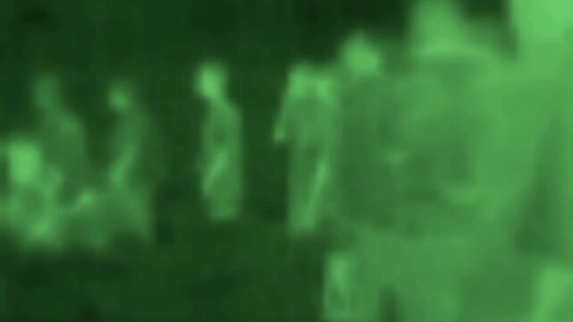 The movement of people in the streets, crowds of people and hustle during rush hour. Image from thermal imager device.