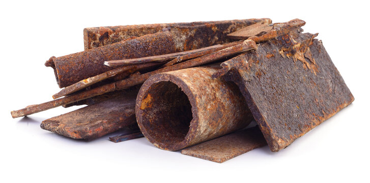 Pile of rusty metal scrap isolated on white background