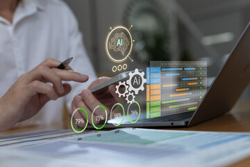 Businessman using AI-powered dashboard to analyze project data and performance metrics. Concept for artificial intelligence in business analytics, data-driven decision making, and smart planning.