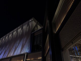 Modern building facade made of cladding with backlighting