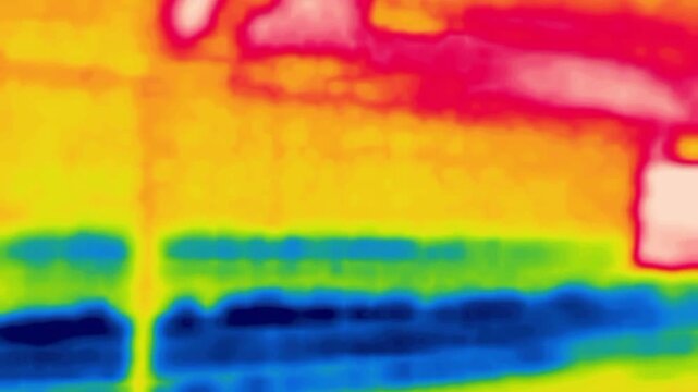 Driving through the streets of the city. Shooting from a car, taxi. Image from thermal imager device.