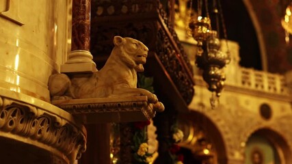 Sofia, Bulgaria - December 29, 2025: Marble sculpture of a lion in the cathedral. Cathedral of St. Alexander Nevsky. Interior decoration of the Orthodox cathedral, elements. Decor. Sculpture of a lion