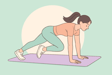 Woman Doing Mountain Climber Exercise on Yoga Mat.