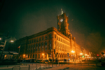 Atmospheric Night View of the Rotes Rathaus in Berlin During Winter Snowfall