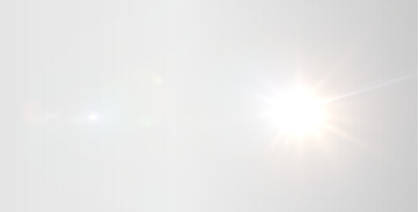 Realistic golden light flare with bright starburst and rays. Overlay,spotlight © TOMA