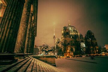Iconic Berlin Cathedral Covered in Snow at Winter Time night