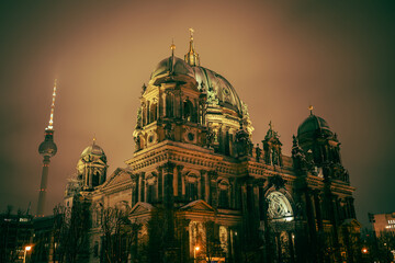 Iconic Berlin Cathedral Covered in Snow at Winter Time night