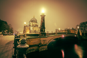 Iconic Berlin Cathedral Covered in Snow at Winter Time night