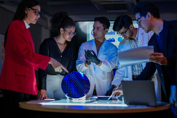 scientists and executives collaborating on Artificial Intelligence (AI) hardware development. Specialists inspecting a silicon wafer and high-speed RAM memory chip in a semiconductor laboratory.