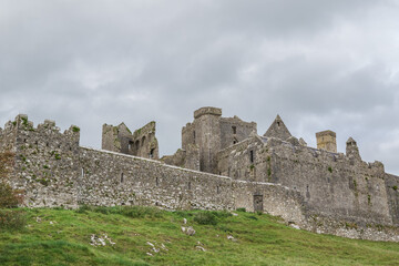 The ruin of Rock of Cashel in County Tipperary, Ireland with an overcast sky