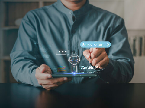 AI assistant and artificial intelligence concept. A professional using a smartphone with virtual chatbot interface processing, automation coding services, and intelligent digital support technology. - Powered by Adobe