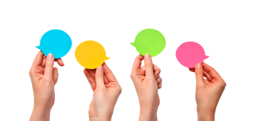 Communication and Dialogue Concept with Four Hands Holding Colorful Speech Bubbles