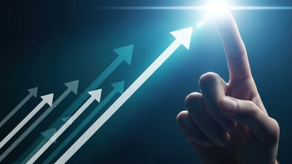 A hand pointing upwards towards a bright light with multiple ascending arrows, symbolizing growth and success.