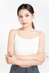 Portrait of beautiful young asian woman with healthy facial skin, isolated on white background.