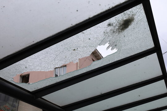 Broken Tempered Glass Panel on Outdoor Canopy Roof, Broken Bus Stop