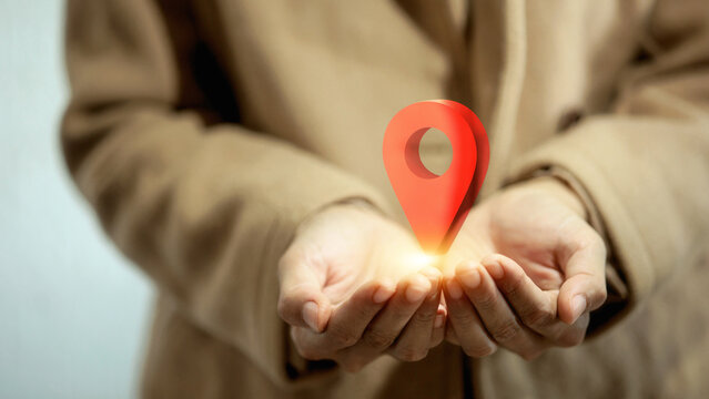 Hand Holding Red Map Pin Pointer Location Icon for Destination Concept
