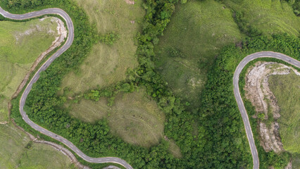 The beautiful and winding roads at the hilltops and across the savanna valleys when the grasses...