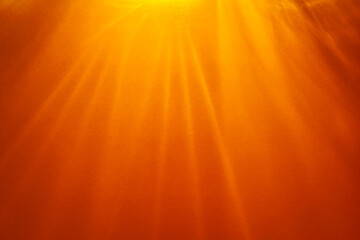 Paper abstraction. Highlights and shadows on orange cardboard. Colored cardboard