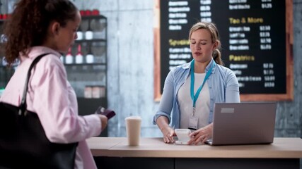 Woman Paying By Credit Card At Shop Coffee