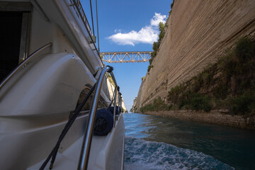Passing through the Corinth Canal by yacht, Greece. 
