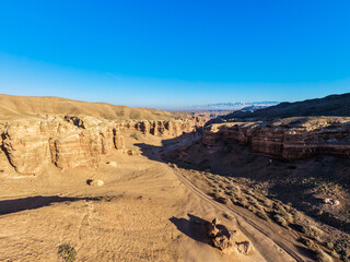Shadows from the cliffs of the Grand Canyon in the rays of the evening sun.