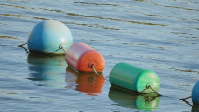 Floating buoys on the water