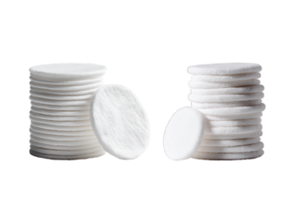 A clean, minimalist product photo of a neat stack of pristine white round cotton pads. One pad is slightly lifted and separated, adding depth and a tactile, ready-to-use feel. Perfectly isolated set o