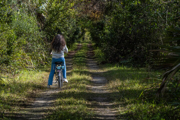 girl on bicycle