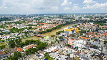 Obraz premium Scenic river flowing through Tangerang City, Banten, Indonesia with a relaxed and natural atmosphere