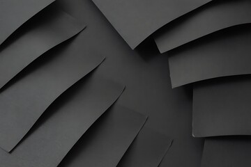 Abstract dark gray paper layers creating a dynamic and modern background