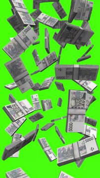 Vertical Czech Koruna bills falling on chromakey, CZK cash rain for mobile reels