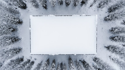 White frozen frame with frosty borders set against abstract icy background
