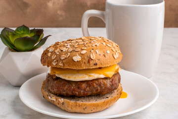 sausage egg and cheese  bagel breakfast sandwich