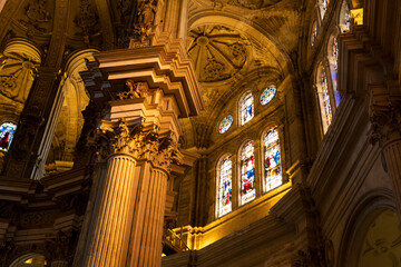 Naklejka premium Intricate architecture with stained glass and columns.. Cathedral of Malaga, Spain